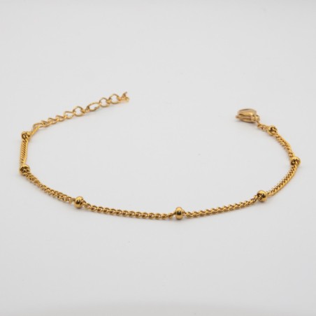 gouden bolletjes aan een schakel armbandje